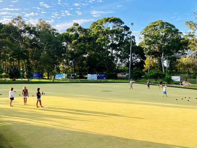 People bowling at Rainbow Beach Bowls Club