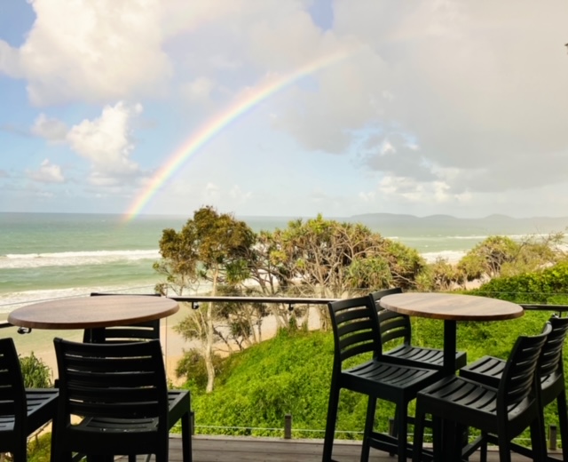 ocean with a rainbow from an ocean view villa