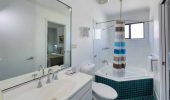The bathroom of a Villa at Rainbow Beach Holiday Village