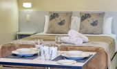 A bed in a Studio Villa at Rainbow Beach Holiday Village