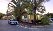 A car parked outside Chalet Cabins at Rainbow Beach Holiday Village