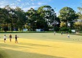 People bowling at Rainbow Beach Bowls Club
