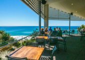 The ocean view from Rainbow Beach Surf Club outdoor dining area